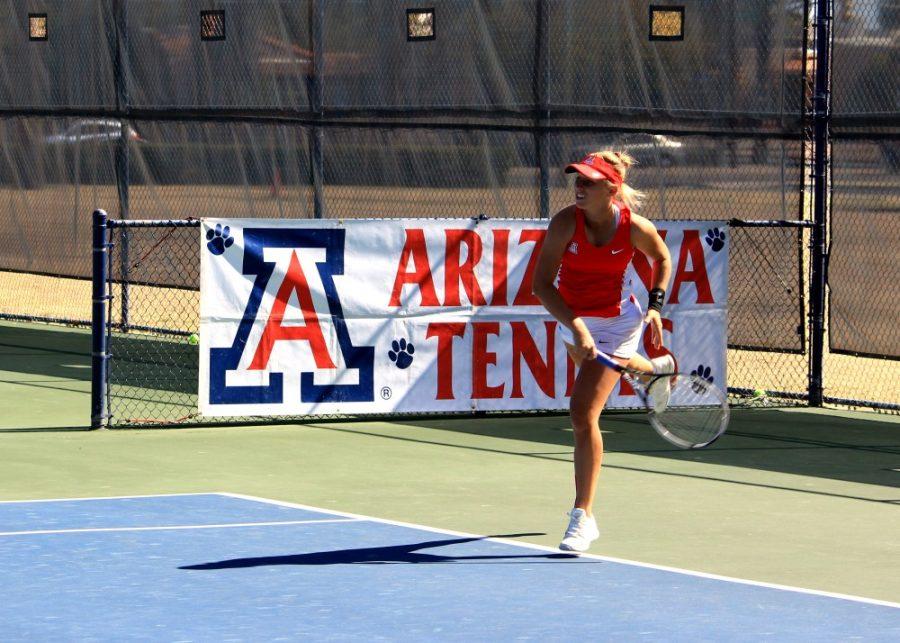 Arizona womens tennis player Shayne Austin returns a volley in a pairs match against San Diego in Tucson on Friday, Feb. 12. The Wildcats will finish the regular season against ASU on Saturday.