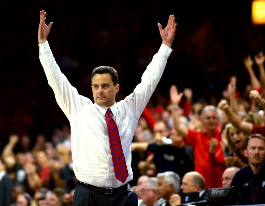 Arizona head coach Sean Miller throws his arms upward following the Wildcats victory over California in McKale Center on Thursday, March 3