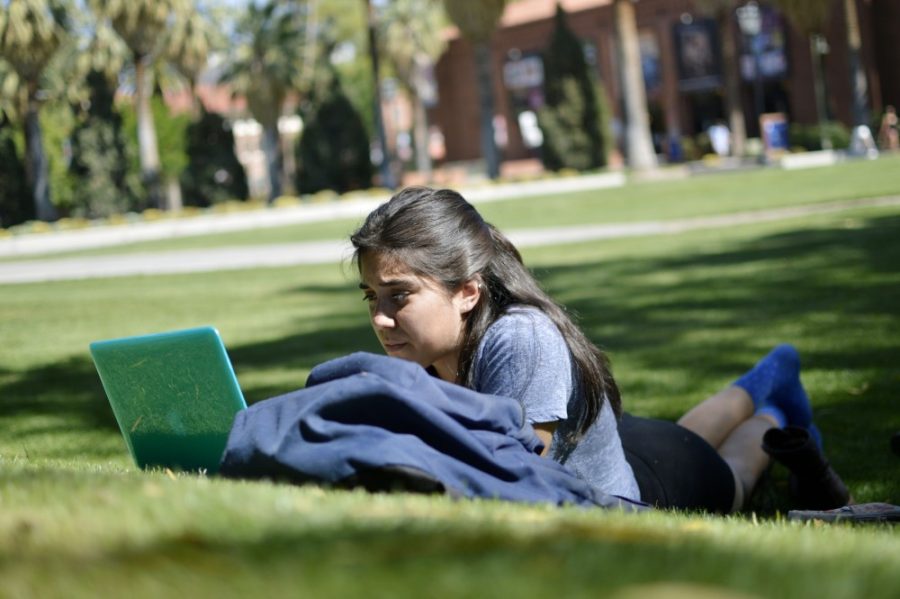 Sierra Frydenlund, a Natural Science freshman, studies for her chemistry test outside the Arizona State Museum on Tuesday Afternoon.