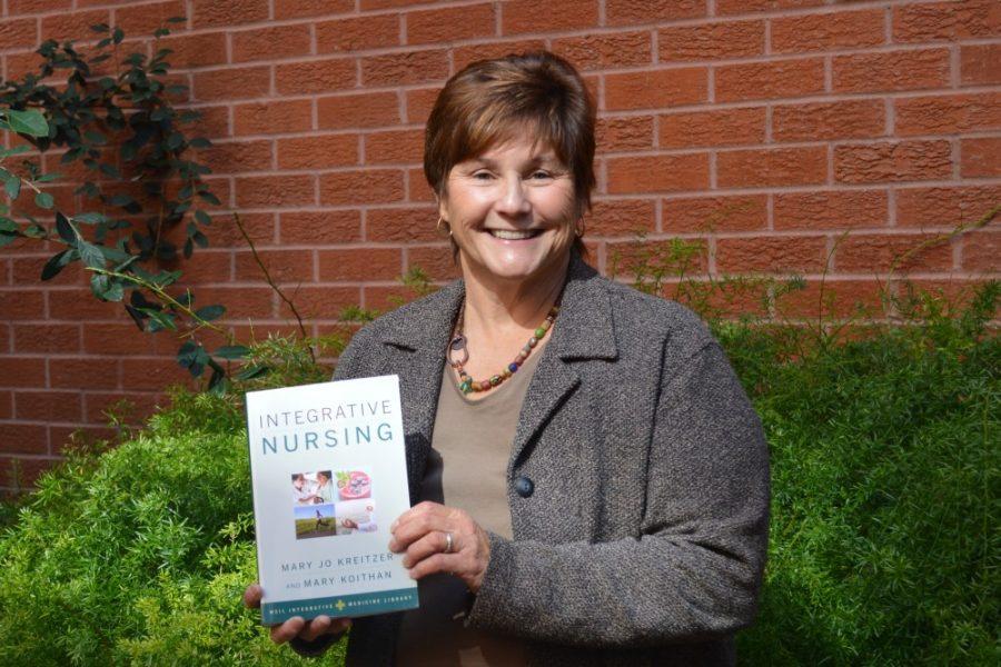 Dr. Mary Koithan displays her Integrative Nursing textbook on Feb. 2, 2015. The UA College of Nursing recently created an integrative nursing fellowship.