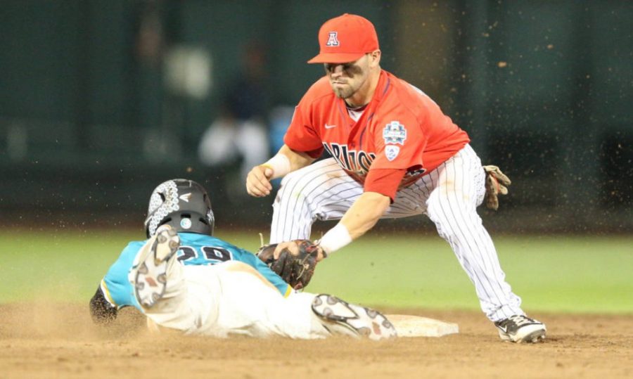 Second baseman Cody Ramer tags a Coastal Carolina baserunner in game two of the championship series of the College World Series on Tuesday, June 28.