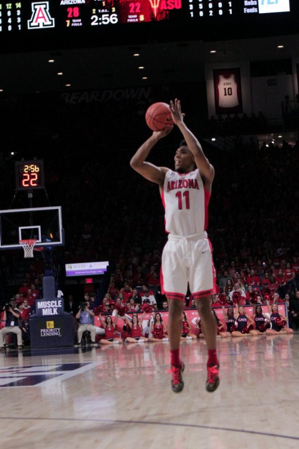 Arizona+guard+Allonzo+Trier+%2811%29+shoots+a+3-pointer+during+Arizonas+99-61+victory+over+Arizona+State+on+Wednesday%2C+Feb.+17.+Trier+averaged+14.8+points+per+game+as+a+freshman+and+will+look+to+improve+that+mark+as+a+sophomore.