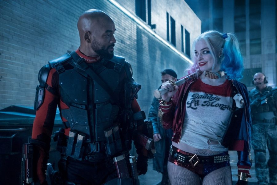 Will Smith and Margot Robby as Dead Shot and Harley Quinn in Suicide Squad, released to theaters on Friday, Aug. 5.