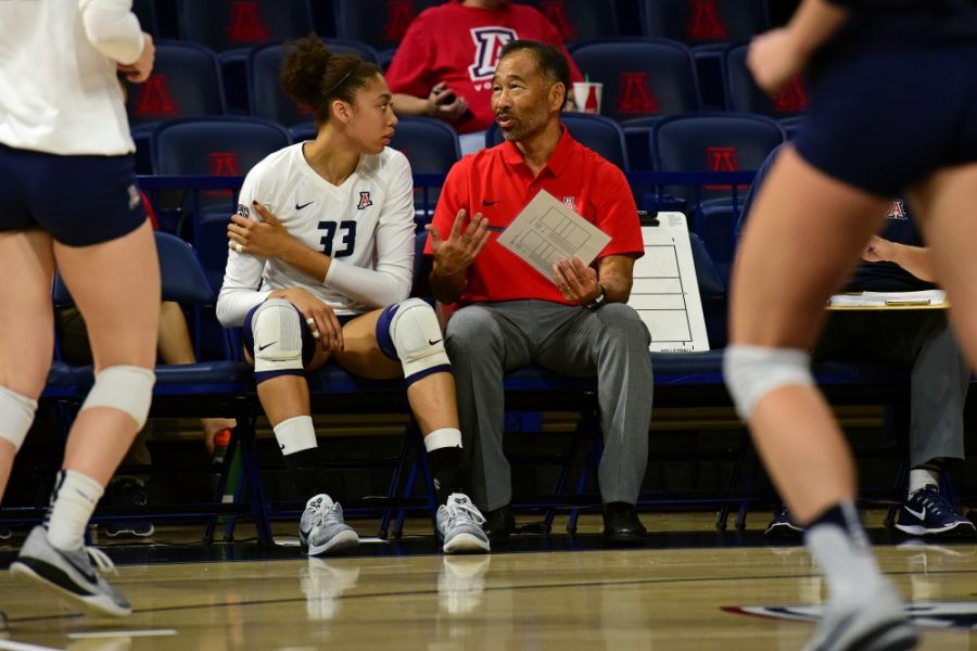 Arizona middle blocker Jade Turner (33) talks with head coach Dave Rubio during Arizonas 3-0 win against Alabama State in McKale Center on Friday, Sept. 2, 2016.