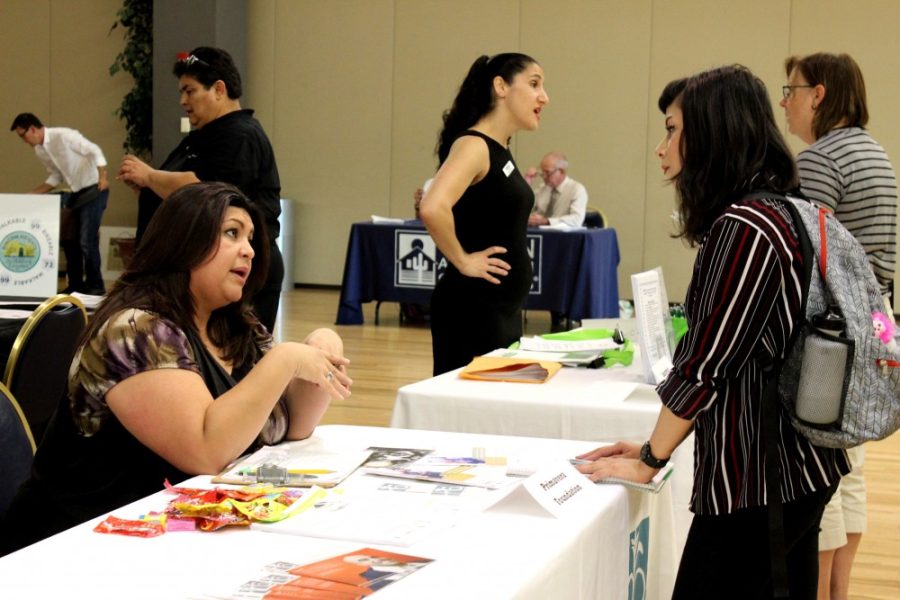 Recent UA graduate Elizabeth Vargas visits a homebuyer expert table at the Homebuyer Expo at the Student Union Memorial Center on Tuesday, Sept. 13. Vargas is looking to take the next big step in her life by buying a home.