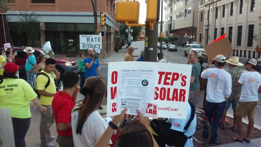A group of protestors gather outside Tucson Electric Powers headquarters on Aug. 31. The group was protesting proposed rate increases of TEPs services.