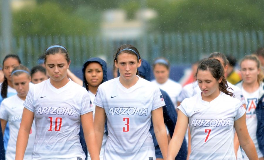 Arizona womens soccer players walk off the field after their 1-2 loss to Utah at Murphey Field at Mulcahy Soccer Stadium on Sunday, Oct. 2, 2016. The loss marks the fourth straight this season for the Wildcats.