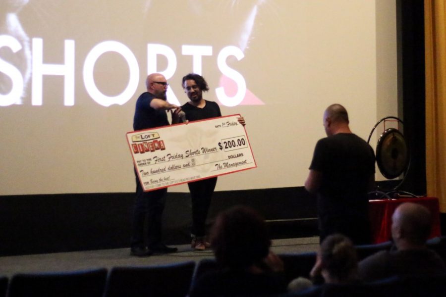 A filmmaker receives his $200 prize for his short film. The Loft Cinemas First Friday Shorts provide an opportunity for aspiring filmmakers, or anyone, to show their work on the big screen - unless they get the gong. 