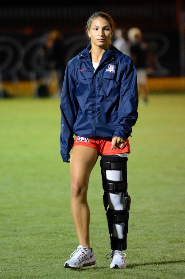 Arizona forward Jillienne Aguilera (21) walks off the field at halftime at Murphey Field at Mulcahy Soccer Stadium on Thursday, Sept. 29, 2016. Aguilera, a freshman, is recovering from a torn ACL.