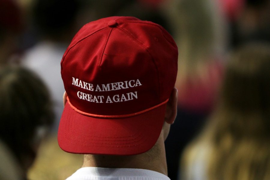 Trump supporter waits eagerly to hear presidential nominee Donald Trump speak at a rally in Phoenix on Saturday, June 18 at the Arizona Veterans Memorial Coliseum. Hundreds in the crowd were sporting Make America Great Again campaign gear.