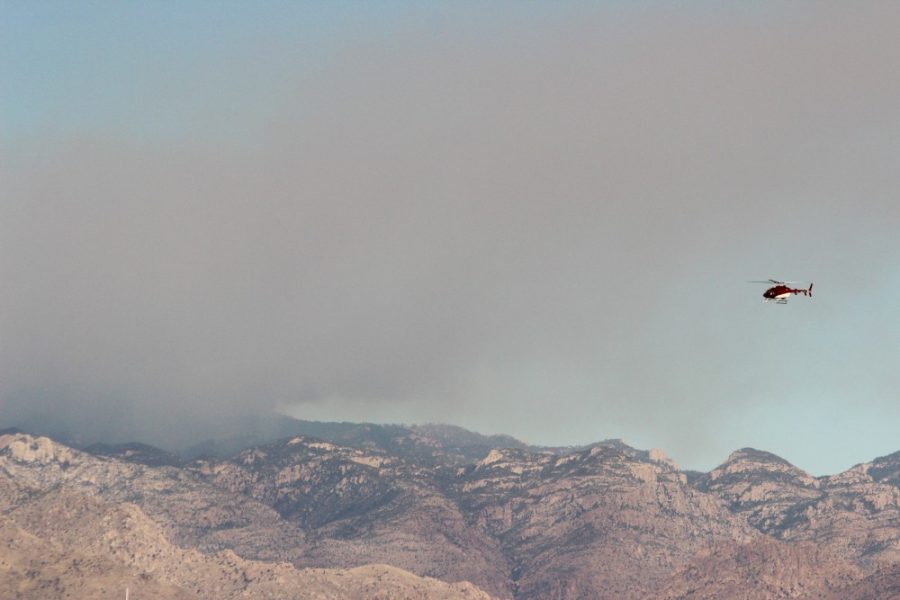 A+forest+service+helicopter+assess+the+smoke+rising+over+the+Catalina+Mountains+on+Monday%2C+Nov.+14.