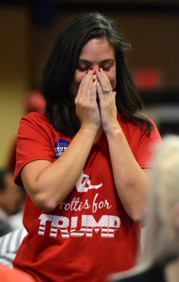Donald Trump supporter Mary Mory takes a quiet moment to contemplate the expected announcement of her candidate's victory during the Pima County GOP Election Night Party at the Sheraton Tucson Hotel & Suites on Tuesday, Nov. 8, 2016.