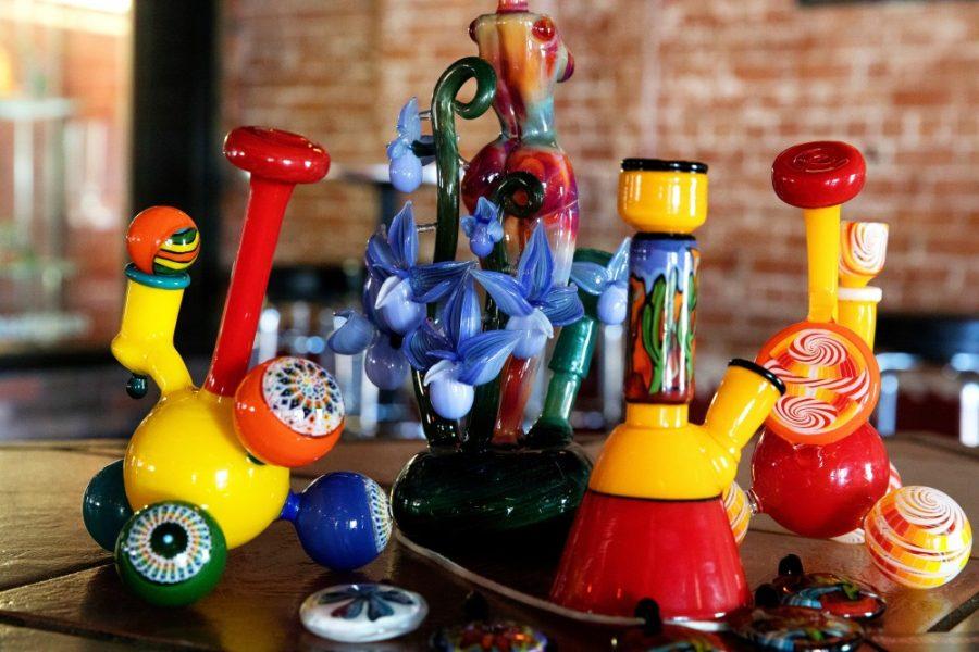 Glass artist Micah Blatts favorite pieces of his work on display at Mr. Heads Art Gallery and Bar on Monday, Nov 7. In addition to blowing glass under the business name, Fathead, Blatt is also the owner of Mr. Heads