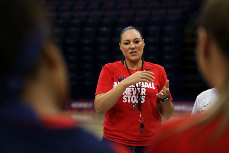 Arizona women’s basketball coach Adia Barnes gives a pep talk to her team before media day on Oct. 10, 2016. The Wildcats were picked to finish dead last in the Pac-12.