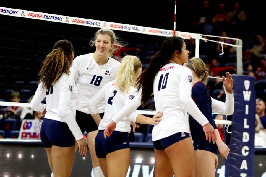 The+Arizona+volleyball+team+congratulates+one+another+after+scoring+during+Arizonas+0-3+loss+to+Stanford+on+Sunday%2C+Nov.+20+in+McKale+Center.+After+their+3-2+win+against+Michigan+State+on+Saturday%2C+Dec.+3+the+Wildcats+are+heading+to+the+Sweet+Sixteen+against+Washington+on+Friday.