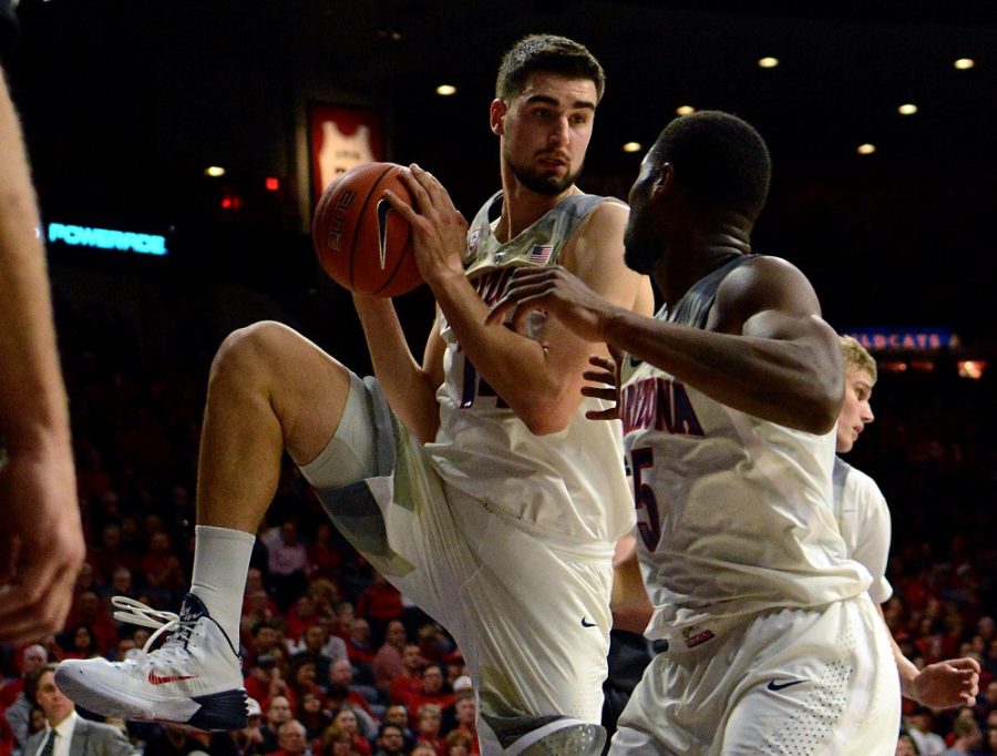 Arizona center Dusan Ristic (14) snags a rebound against UC Irvine in McKale Center on Tuesday, Dec. 6. The Wildcats beat the Anteaters 79-57.