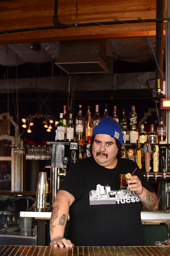 Bartender Steven Yanez Romo poses behind the bar at the Flycatcher, Jan. 25.