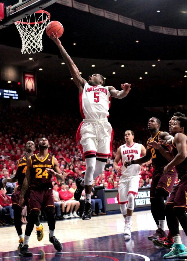 Arizona guard Kadeem Allen (5) goes for the layup while playing against ASU in McKale Center on Wednesday, Feb. 17, 2016. Allen scored 12 points against the Sun Devils.