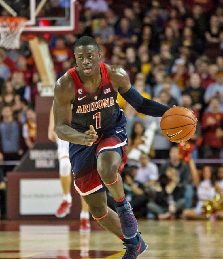 Rawle Alkins (1) pushes the ball up the court against USC on Thursday, Jan. 19. The Wildcats won 73-66.