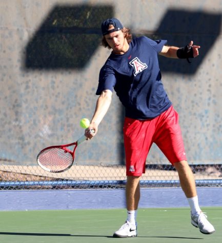 Arizona men's tennis athlete Trevor James swings on the tennis court on Jan. 1, 2015.