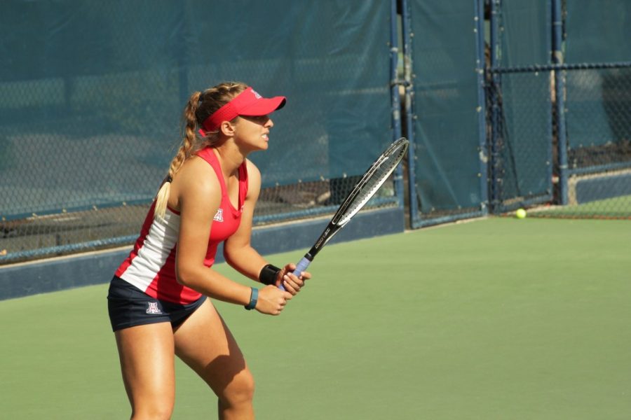 An Arizona womens tennis player awaits a serve during the Wildcats match against Tulane University on Feb. 2. 