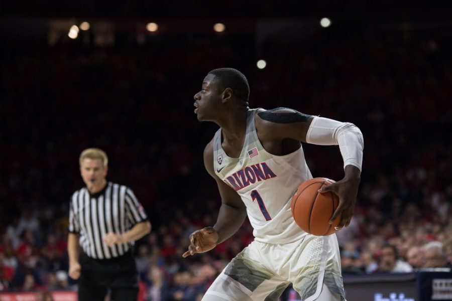 <p>Arizona's Rawle Alkins (1) looks for a teammate to pass to during the UA-USC game on Thursday, Feb. 23. Arizona beat USC 90-77.</p>