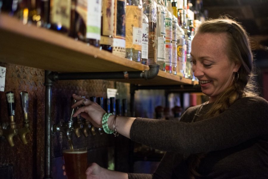 Olivia Reardon tends the bar at Saint Charles Tavern, located at 1632 South Fourth Ave. in Tucson, Ariz. on Wednesday, Feb. 1. Reardon also bartends at the Rialto downtown.