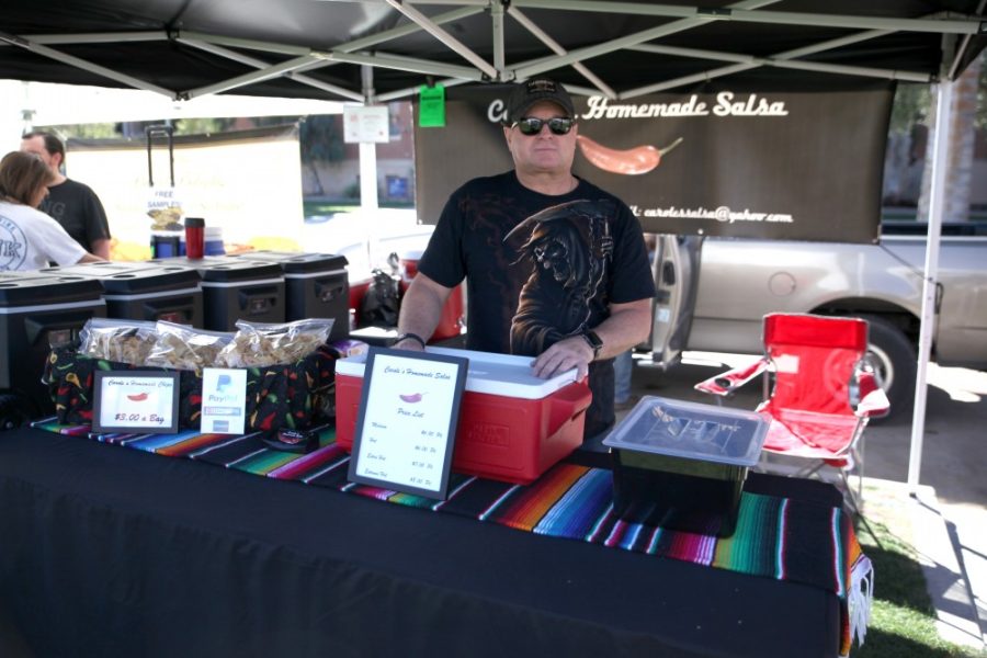 Andy Durant of Caroles Homemade Salsa at the UA Farmers Market on the UA Mall on Wednesday, Feb. 22.