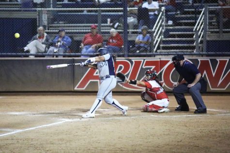 Arizona third baseman Katiyana Mauga (34) bats during the softball game against CSUN on Feb. 10 at Hillenbrand Stadium. 