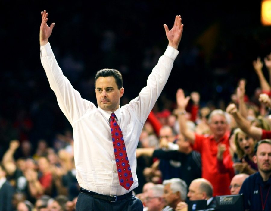 Arizona mens basketball head coach Sean Miller throws his arms up following the Wildcats last-minute victory over California in McKale Center on Mar. 3, 2016. The Arizona Board of Regents extended his contract until 2022 on Thursday.