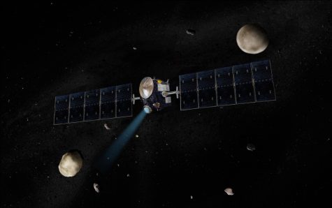 Artist concept of the Dawn spacecraft with Vesta and Ceres. It was Dawn that discovered Ahuna Mons in 2015.