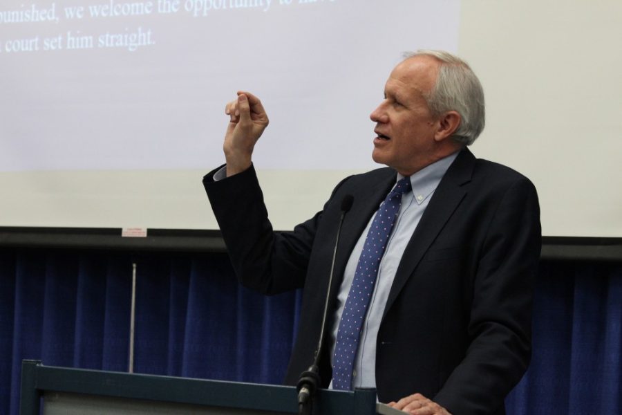 David McCraw, New York Times vice president and deputy general counsel, explaining fake news at the James E. Rogers College of Law on Monday, Feb. 13. McCraw gave a few explanations about Donald Trumps constant use of Twitter and his definition of fake media.