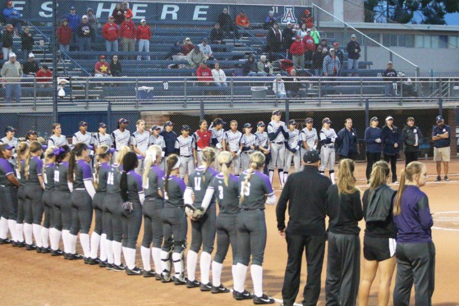The Arizona softball team lines up with their opponent Abilene Christian before their game on Feb. 17.