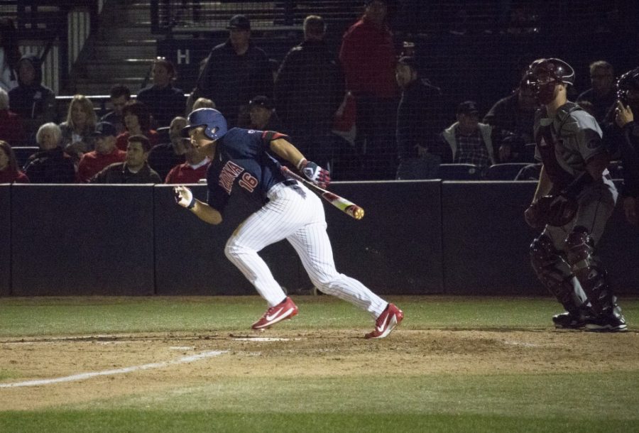 Arizona outfielder Mitchell Morimoto (16) runs to first base after batting during the baseball game against Eastern Kentucky on Feb. 17 at Hi Corbett field.