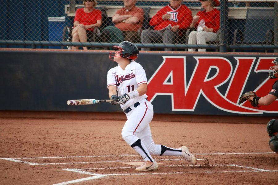 Arizona batter Mo Mercado (11) during the Wildcats softball game against the Texas Longhorns on March 5 at Hillenbrand Stadium. The Wildcats completed a three-game sweep of the Longhorns on Sunday. 