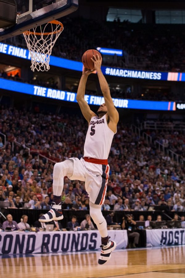 Gonzagas Nigel Williams-Goss jumps home a slam dunks during the Gonzaga-Northwestern game on Saturday, March 18.
