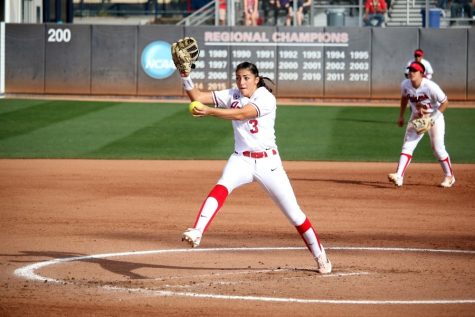 Arizona Wildcats pitcher Danielle O'Toole throws a pitch against No. 21 Baylor at Hillenbrand Stadium on Feb. 10. O'Toole grew up idolizing UA great Jenny Finch.