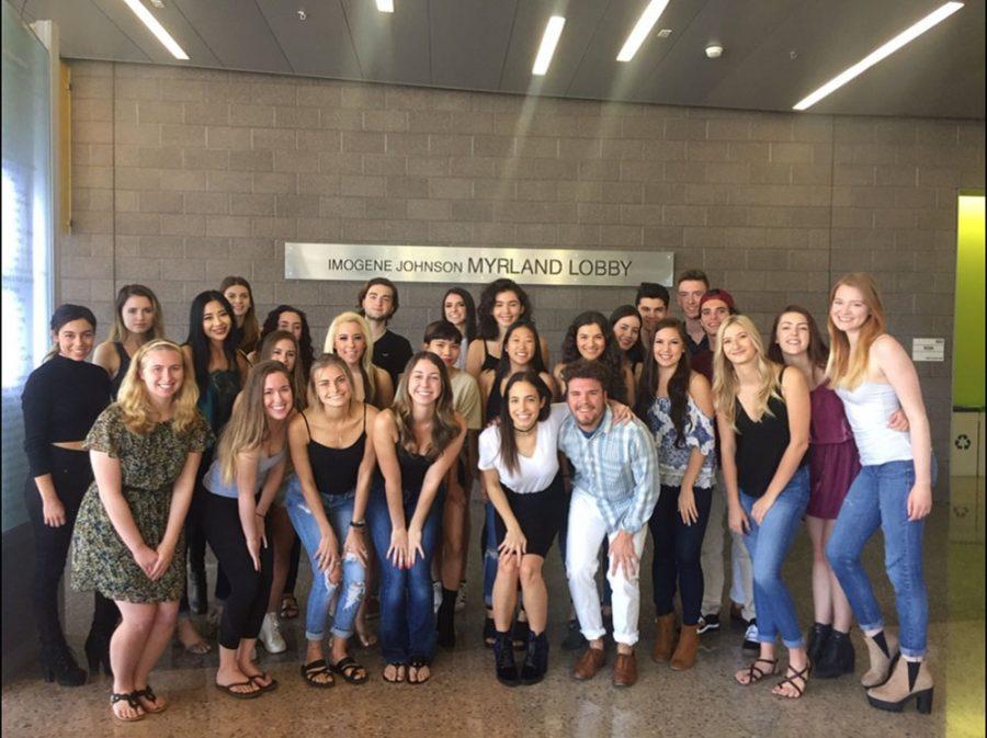 Jenna DeMaio, fifth from the left, and Gabriel Nakovich, sixth from the left, pose with their models at the College of Agriculture and Life Sciences Building. DeMaio is event coordinator of TREND and Nakovich is vice president. 