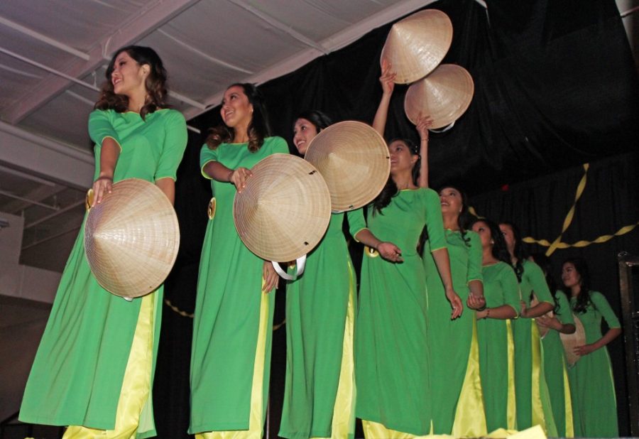 All nine contestants of the Miss Vietnam Southern Arizona pageant perform a traditional Vietnamese hat dance at the pageant April 8. The contestants have been practicing this performance for months.