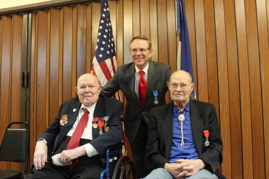 Col. Robert D. Dwan, left, Gerrit Steenblik, center, and Cpl. Lawrence W. Strahler, right, pose for a photo at the American Legion Post 109 Sunday, April 23. Both WWII Veterans earned the Ordre national de la Legion dhonneur, Frances highest honor.