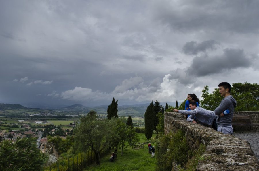 From left to right, Olivia Haddad, Sean Horan, and Khas Ochir look out from the edge of Orvieto, Italy on Saturday, May 23, 2015. The had arrived in Orvieto the day prior for the annual Arizona in Italy summer study abroad program through the University of Arizona. (Alex McIntyre)