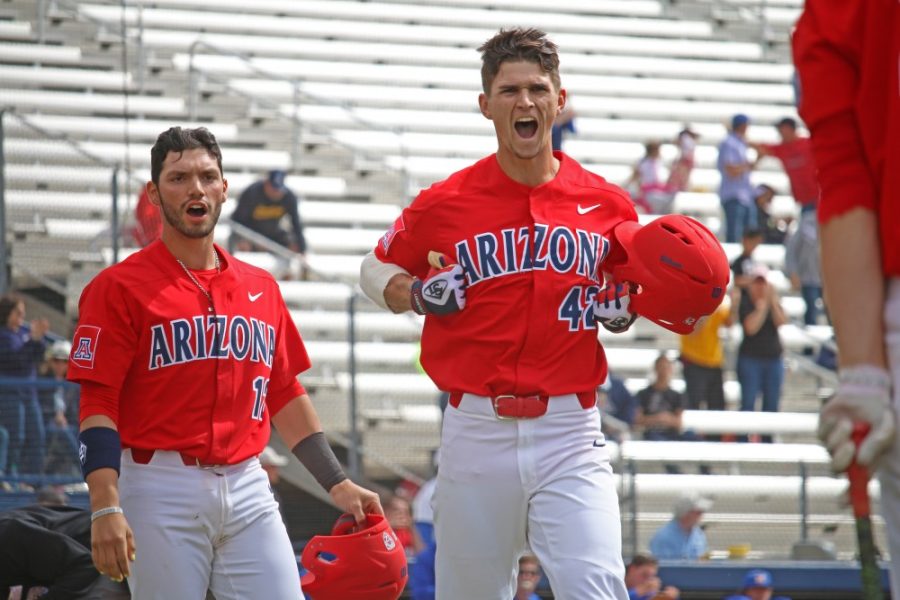Arizona outfielder Jared Oliva (42) celebrates after game three of the series against McNeese State on Feb. 26 at Hi Corbett Field. The Wildcats won 12-5.