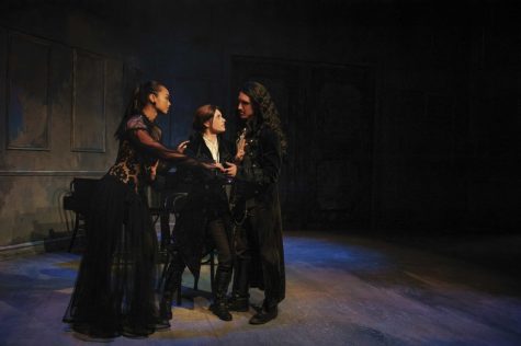 The bizarre love triangle with Lady Olivia (Vinessa Vidotto), Viola (Tyler Reaser) disguised as a boy, and Duke Orsino (Colt Watkiss) in TWELFTH NIGHT presented by UA’s Arizona Repertory Theatre.