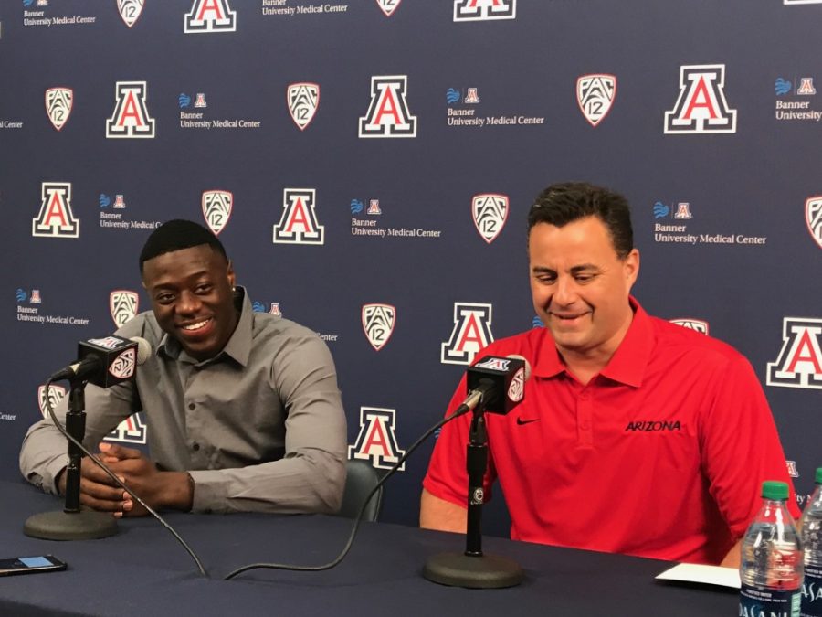 Arizona guard Rawle Alkins sits with head coach Sean Miller during a press conference May 22, 2017. Alkins announced he was returning to the Wildcats after testing the waters of the NBA.