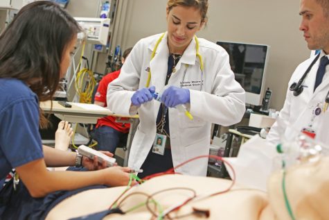 The proctor depicts a vivid scene of a man thrown out the back of a van on the doorsteps of their hospital, leaving the students to figure out his injuries and ailments. Medical students perform a simulated operation on a hi-tech dummy in the Arizona Simulation Technology and Education Center, or ASTEC lab. The dummy is programmed with a set of conditions and to respond to particular stimuli as students attempt to treat it.