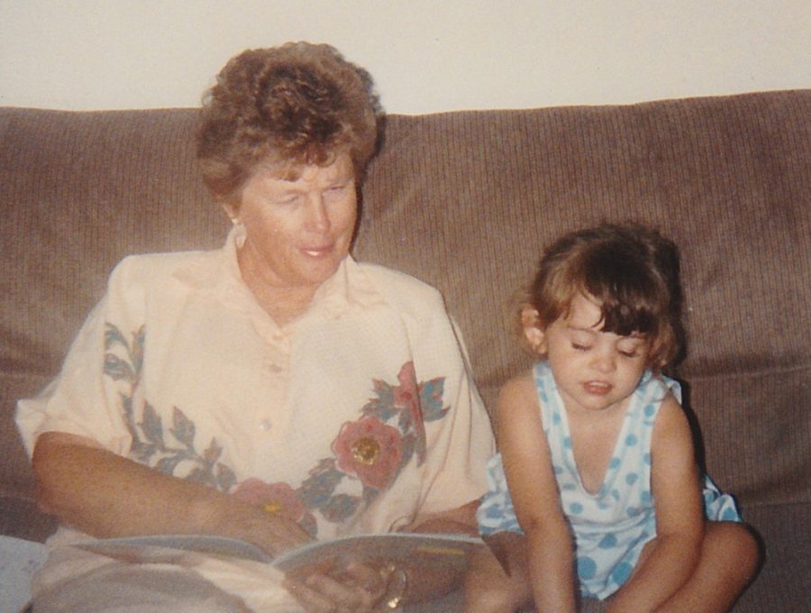 Ardith Verwys, left, reads a book to her granddaughter Jamie Verwys, right, pictured around the age 6. Reading together was among the pairs favorite activities.