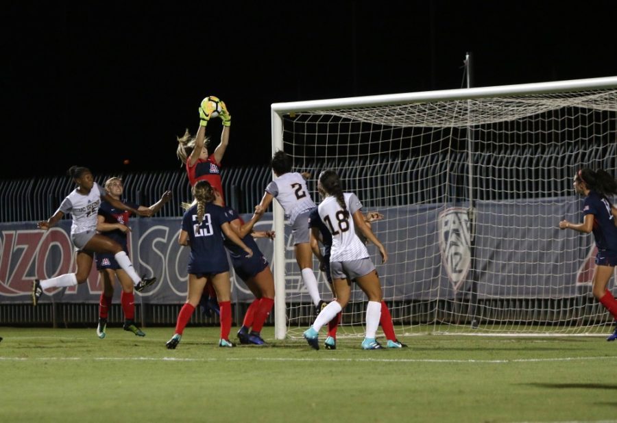 Arizona+goalie+Lainey+Burdett+catches+the+ball+mid-air+during+the+womens+soccer+game+against+UC+Irvine+on+Aug.+25.