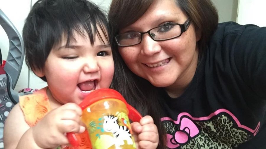 Aurora Begay, right, poses with her two-year-old daughter.