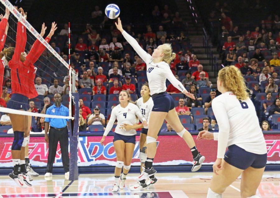 Arizona+outside+hitter+Paige+Whipple+%2810%29+tips+the+ball+over+the+net+during+game+three+of+the+Cactus+Classic+against+Radford+on+Sept.+2.