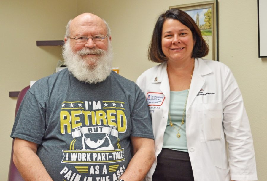 Dr. Nancy Sweitzer, principal investigator in a clinical study to evaluate whether administration of a small protein (ANG 1-7) to patients at the time of bypass surgery can safely and effectively protect cognitive function, poses with study participant Bruce Cameron.